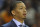 Oct 30, 2014; Cleveland, OH, USA; Cleveland Cavaliers assistant coach Tyronn Lue stands near the bench against the New York Knicks at Quicken Loans Arena. New York won 95-90. Mandatory Credit: David Richard-USA TODAY Sports