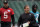 Oct 23, 2015; London, United Kingdom; Jacksonville Jaguars offensive coordinator Greg Olson (C) and quarterback Blake Bortles (5) looks on during practice at Allianz Park in preparation for the NFL International Series game against the Buffalo Bills. Mandatory Credit: Kirby Lee-USA TODAY Sports