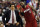 Miami Heats' LeBron James (6) talks to coach Eric Spoelstra in the second half of an NBA basketball game against the Philadelphia 76ers on Friday, Feb. 3, 2012, in Philadelphia. The Heat won 99-79. (AP Photo/Michael Perez)