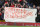 Liverpool fans hold a banner as they protest against the recently announced rise in ticket prices during the English Premier League football match between Liverpool and Sunderland at Anfield in Liverpool, northwest England, on February 6, 2016. / AFP / LINDSEY PARNABY / RESTRICTED TO EDITORIAL USE. No use with unauthorized audio, video, data, fixture lists, club/league logos or 'live' services. Online in-match use limited to 75 images, no video emulation. No use in betting, games or single club/league/player publications.  /         (Photo credit should read LINDSEY PARNABY/AFP/Getty Images)