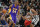 Los Angeles Lakers guard Kobe Bryant (24) attempts to evade San Antonio Spurs forward Kawhi Leonard during the second half of an NBA basketball game, Saturday, Feb. 6, 2016, in San Antonio. San Antonio won 106-102. (AP Photo/Darren Abate)