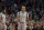 Boston Celtics guard Avery Bradley (0) and guard Evan Turner (11) react after the Celtics scored against the Sacramento Kings in the fourth quarter of an NBA basketball game, Sunday, Feb. 7, 2016, in Boston. The Celtics won 128-119. (AP Photo/Steven Senne)
