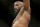 Yoel Romero reacts after defeating Ronaldo Souza in a middleweight mixed martial arts bout at UFC 194, Saturday, Dec. 12, 2015, in Las Vegas. (AP Photo/John Locher)