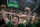 CHINA OUT  BEIJING, CHINA - JUNE 28: Ultra supporters and fans of the Beijing Guoan FC celebrate together after a goal against Chongcing Lifan FC during their Chinese Super League match on June 28, 2015 in Beijing, China. There are growing legions of ardent supporters and fans of China's football clubs. The government is also trying to foster a football culture in the country by mandating football programs in 20,000 Chinese schools in a recent plan devised by President Xi Jinping to make China a football power. (Photo by Kevin Frayer/Getty Images)