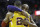 Los Angeles Lakers' Kobe Bryant, back, hugs Cleveland Cavaliers' LeBron James as Bryant leaves the game in the second half of an NBA basketball game Wednesday, Feb. 10, 2016, in Cleveland. The Cavaliers won 120-111. (AP Photo/Tony Dejak)