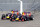 SHANGHAI, CHINA - APRIL 12:  Teammates Daniel Ricciardo of Australia and Infiniti Red Bull Racing and Daniil Kvyat of Russia and Infiniti Red Bull Racing compete going into turn one during the Formula One Grand Prix of China at Shanghai International Circuit on April 12, 2015 in Shanghai, China.  (Photo by Mark Thompson/Getty Images)