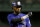 Colorado Rockies' Jose Reyes (7) gestures to his bench after a base hit during the first inning of a baseball game against the Arizona Diamondbacks, Tuesday, Sept. 29, 2015, in Phoenix. (AP Photo/Matt York)
