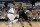 Dallas Mavericks' Wesley Matthews (23) defends as Brooklyn Nets' Joe Johnson (7) drives to the basket in the first half of an NBA basketball game, Friday, Jan. 29, 2016, in Dallas. (AP Photo/Tony Gutierrez)