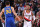 PORTLAND, OR - MARCH 24:  Damian Lillard #0 of the Portland Trail Blazers brings the ball up court against Stephen Curry #30 of the Golden State Warriors on March 24, 2015 at the Moda Center in Portland, Oregon. NOTE TO USER: User expressly acknowledges and agrees that, by downloading and or using this Photograph, user is consenting to the terms and conditions of the Getty Images License Agreement. Mandatory Copyright Notice: Copyright 2015 NBAE (Photo by Sam Forencich/NBAE via Getty Images)