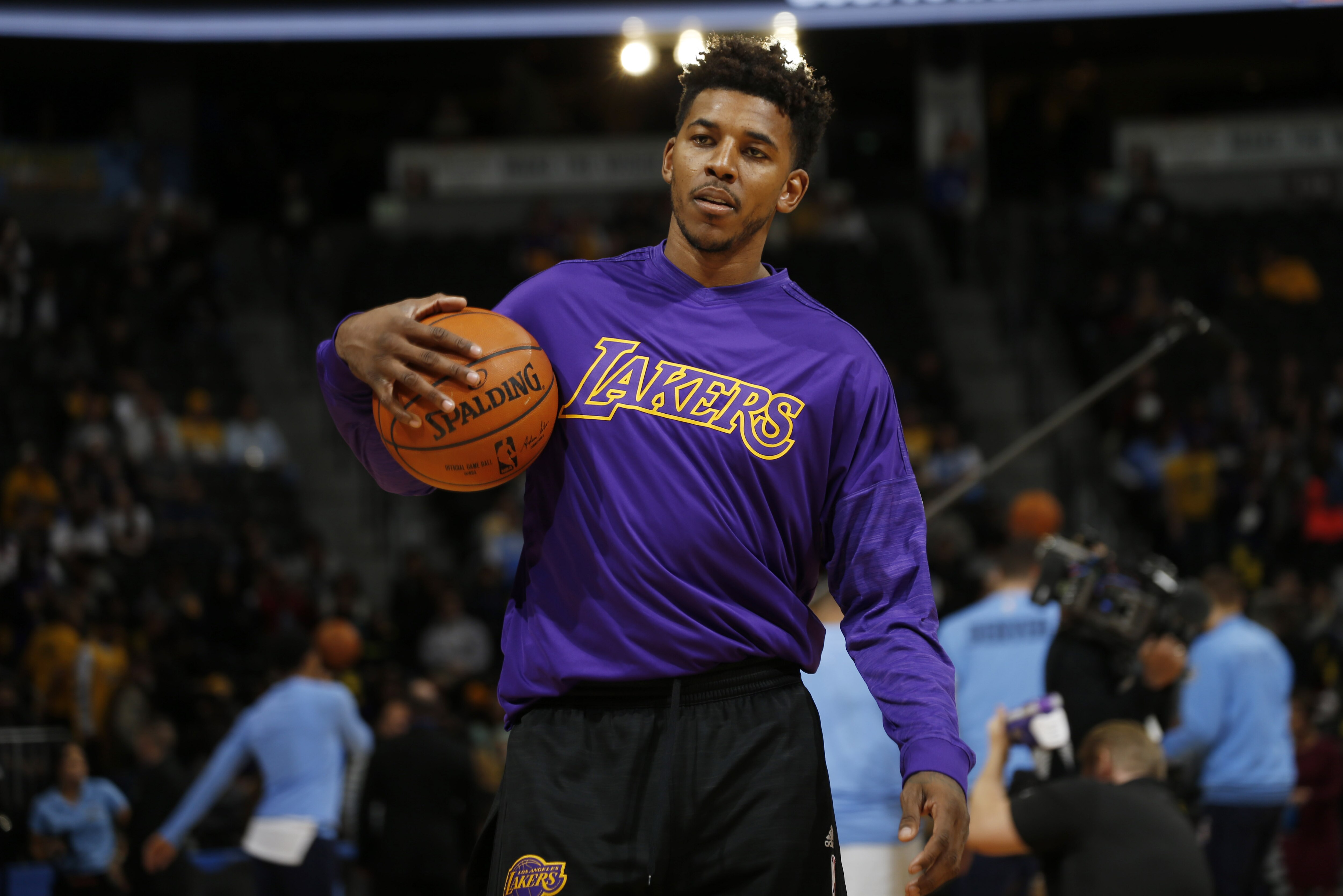 Los Angeles Lakers forward Nick Young (0) in the first half of an NBA basketball gameTuesday, Dec. 22, 2015, in Denver. (AP Photo/David Zalubowski)