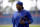 New York Mets' Yoenis Cespedes walks onto a field during spring training baseball practice Friday, Feb. 26, 2016, in Port St. Lucie, Fla. (AP Photo/Jeff Roberson)
