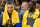 CLEVELAND, OH - JANUARY 18: Stephen Curry #30 and Draymond Green #23 of the Golden State Warriors joke on the bench during the fourth quarter against the Cleveland Cavaliers at Quicken Loans Arena on January 18, 2016 in Cleveland, Ohio. The Warriors defeated the Cavaliers 132-98. NOTE TO USER: User expressly acknowledges and agrees that, by downloading and/or using this photograph, user is consenting to the terms and conditions of the Getty Images License Agreement. Mandatory copyright notice. (Photo by Jason Miller/Getty Images)