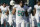 Miami Dolphins defensive end Olivier Vernon (50) walks the sidelines during the second half of an NFL football game against the Miami Dolphins, Sunday, Dec. 7, 2014, in Miami Gardens, Fla. (AP Photo/Wilfredo Lee)