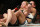Miesha Tate, a la derecha, hace una llave de estrangulamiento sobre Holly Holm en su combate de artes marciales mixtas de UFC 196, el sábado 5 de marzo de 2016 en Las Vegas. (AP Foto/Eric Jamison)