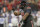 Louisville's Sheldon Rankins (98) reacts after sacking the Georgia quarterback during the first half of the Belk Bowl NCAA college football game in Charlotte, N.C., Tuesday, Dec. 30, 2014. (AP Photo/Chuck Burton)