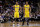 MILWAUKEE, WI - FEBRUARY 22: D'Angelo Russell #1 of the Los Angeles Lakers and Jordan Clarkson #6 watch Kobe Bryant shoot a free throw during the game against the Milwaukee Bucks at BMO Harris Bradley Center on February 22, 2016 in Milwaukee, Wisconsin. NOTE TO USER: User expressly acknowledges and agrees that, by downloading and or using this photograph, User is consenting to the terms and conditions of the Getty Images License Agreement. (Photo by Mike McGinnis/Getty Images)