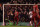 de Manchester United's Spanish goalkeeper David de Gea (L) attempts to save penalty from Liverpool's English striker Daniel Sturridge (C) during the UEFA Europa League round of 16, first leg football match between Liverpool and Manchester United at Anfield in Liverpool, northwest England on March 10, 2016. / AFP / PAUL ELLIS        (Photo credit should read PAUL ELLIS/AFP/Getty Images)