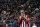 Atletico Madrid's Uruguayan defender Diego Godin gestures after missing a goal opportunity during the Spanish league football match Club Atletico de Madrid vs Real Sociedad de Futbol at the Vicente Calderon stadium in Madrid on March 1, 2016. / AFP / GERARD JULIEN        (Photo credit should read GERARD JULIEN/AFP/Getty Images)