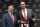 Houston Texans quarterback Brock Osweiler, right, holds his new jersey as he poses with owner Bob McNair during a news conference Thursday, March 10, 2016, in Houston. The Texans have filled their biggest need, starting free agency with a splash by snagging Osweiler from Denver. (AP Photo/David J. Phillip)