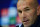 Real Madrid's French coach Zinedine Zidane sits during a press conference on March 7, 2016 at Real Madrid Sport City in Madrid on the eve of their UEFA Champions League football match Real Madrid CF vs AS Roma  / AFP / JAVIER SORIANO        (Photo credit should read JAVIER SORIANO/AFP/Getty Images)