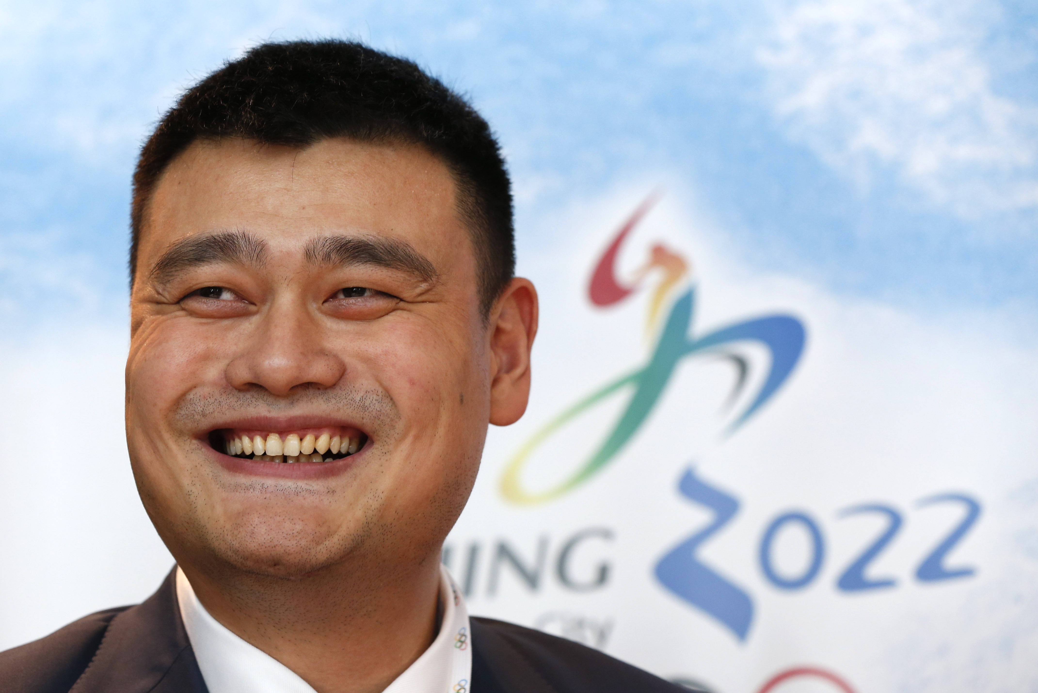 Yao Ming, retired Chinese professional basketball player smiles during a press conference for Beijing 2022 Olympic bid in Kuala Lumpur, Malaysia, Wednesday, July 29, 2015. Malaysia is hosting the 128th International Olympic Committee executive board meeting where the vote for the host cities of the 2022 Olympic Winter Games and for the 2020 Youth Olympic Winter Games will take place. (AP Photo/Vincent Thian)