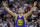 Golden State Warriors guard Stephen Currycelebrates during overtime in the team's NBA basketball game against the Utah Jazz on Wednesday, March 30, 2016, in Salt Lake City. The Warriors won 103-96. (AP Photo/Rick Bowmer)
