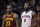 Cleveland Cavaliers forward LeBron James (23) and Detroit Pistons center Andre Drummond (0) wait before a free throw during the first half of an NBA basketball game, Friday, Jan. 29, 2016 in Auburn Hills, Mich. (AP Photo/Carlos Osorio)