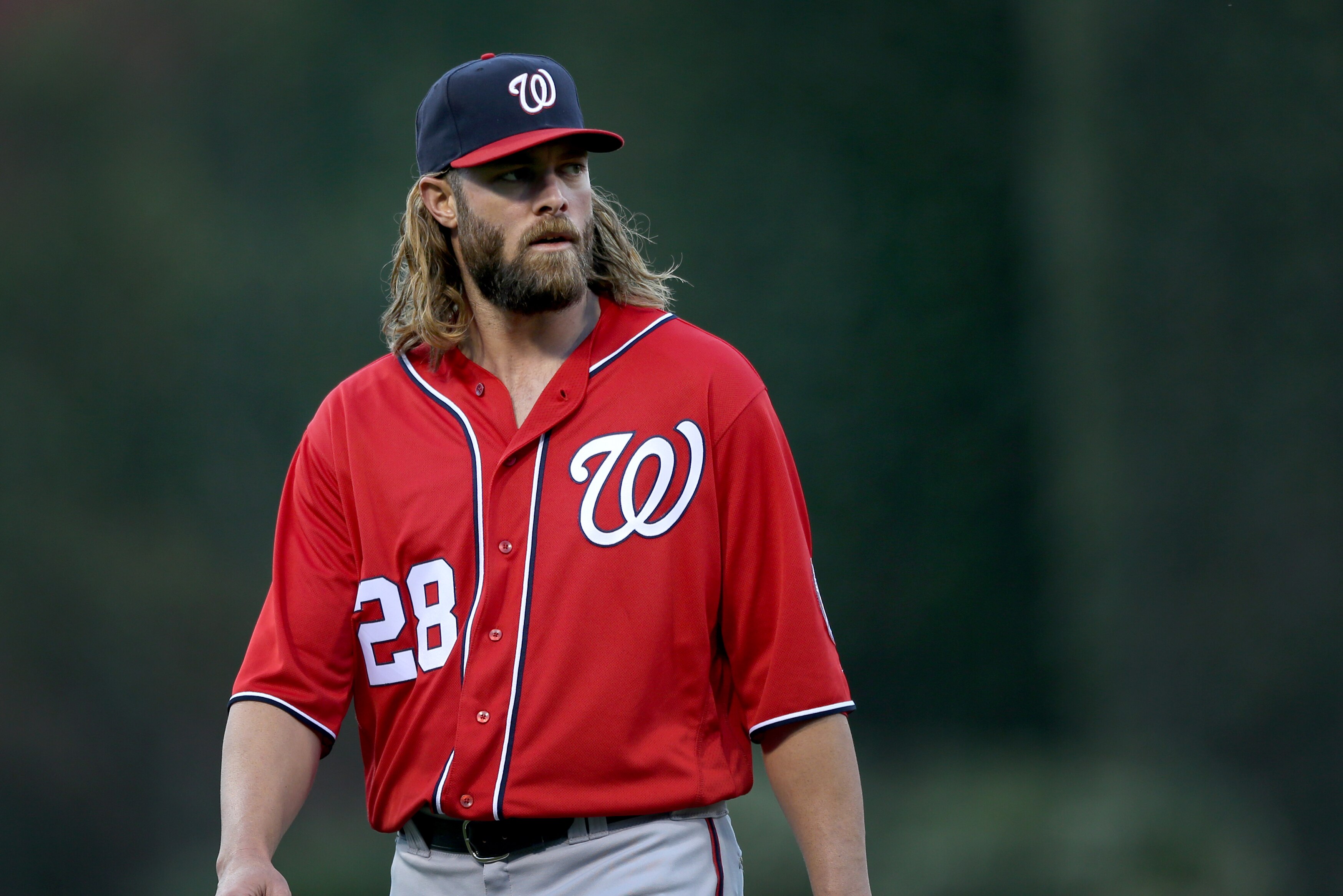 Washington Nationals left fielder Jayson Werth (28) walks on the field during warmups before the start of a baseball game against the Philadelphia Phillies, Saturday, April 16, 2016, in Philadelphia. (AP Photo/Laurence Kesterson)