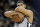 San Antonio Spurs center Tim Duncan (21) holds the ball as he prepares for the first half in Game 1 of a first-round NBA basketball playoff series against the Memphis Grizzlies, Sunday, April 17, 2016, in San Antonio. (AP Photo/Eric Gay)