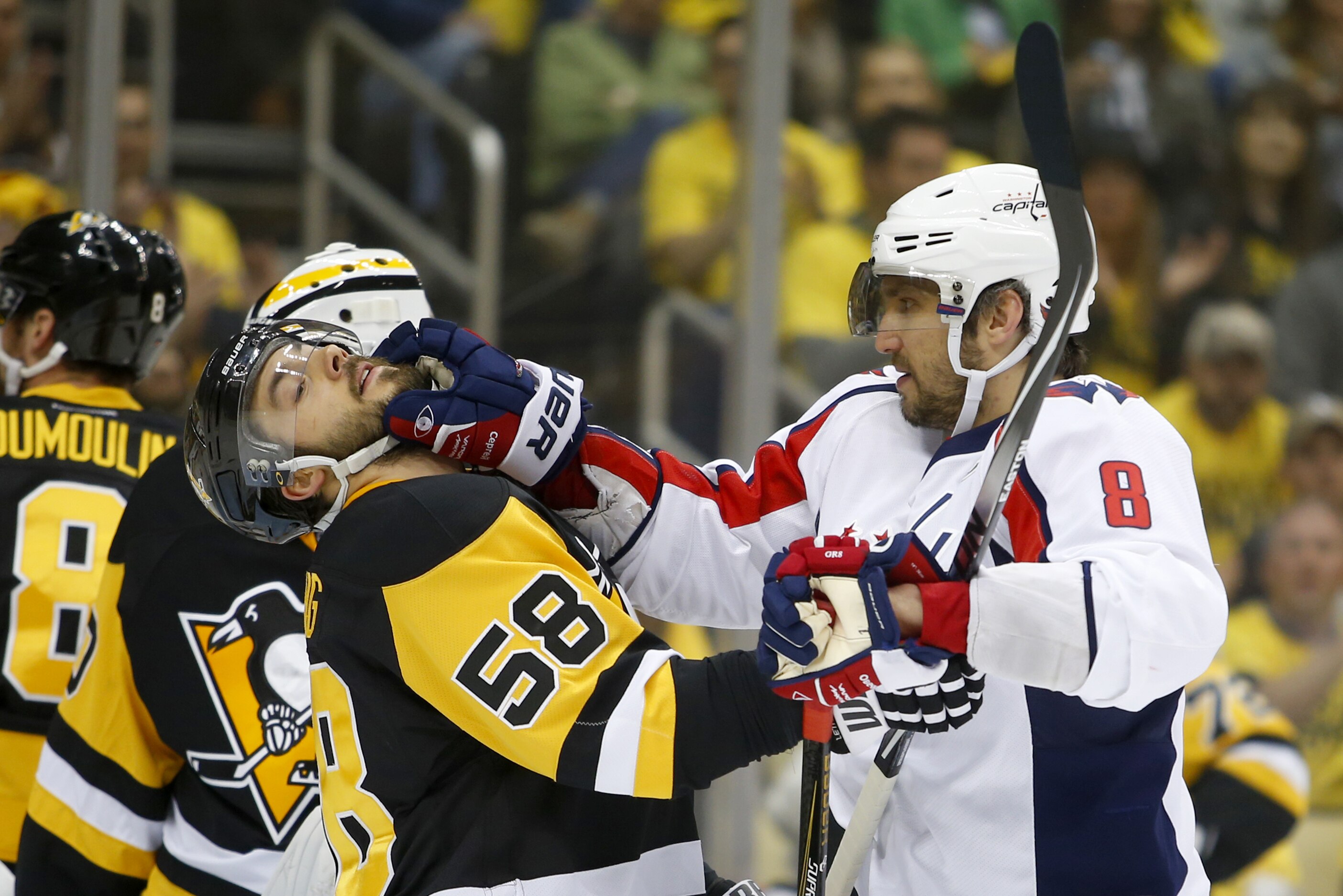 PITTSBURGH, PA - MAY 02: Alex Ovechkin #8 of the Washington Capitals face washes Kris Letang #58 of the Pittsburgh Penguins in Game Three of the Eastern Conference Second Round during the 2016 NHL Stanley Cup Playoffs at Consol Energy Center on May 2, 2016 in Pittsburgh, Pennsylvania. (Photo by Justin K. Aller/Getty Images)