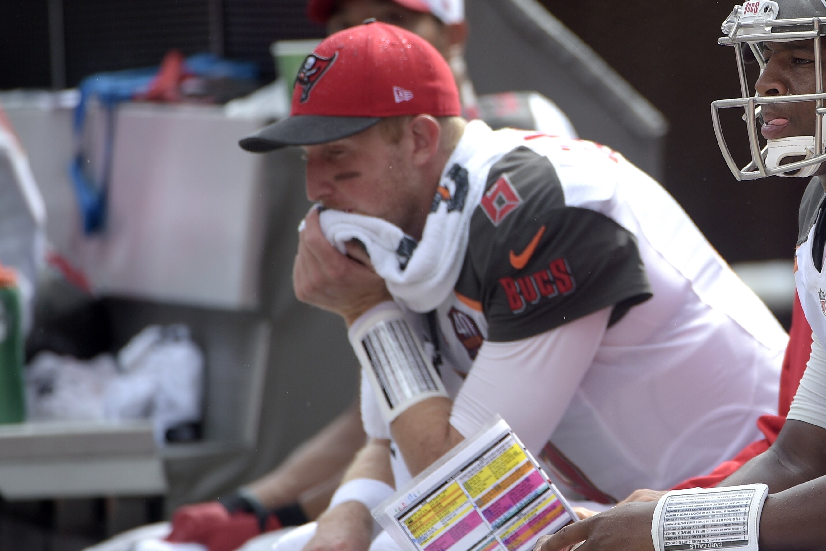 Tampa Bay Buccaneers quarterback Mike Glennon (8) and quarterback Jameis Winston, right, sit on the bench during the second half of an NFL football game against the Carolina Panthers in Tampa, Fla., Sunday, Oct. 4, 2015. The Panthers won 37-23. (AP Photo/Phelan M. Ebenhack)