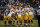 The Washington Redskins offense huddles before a play against the Chicago Bears during the second half of an NFL football game, Sunday, Dec. 13, 2015, in Chicago. (AP Photo/Charles Rex Arbogast)