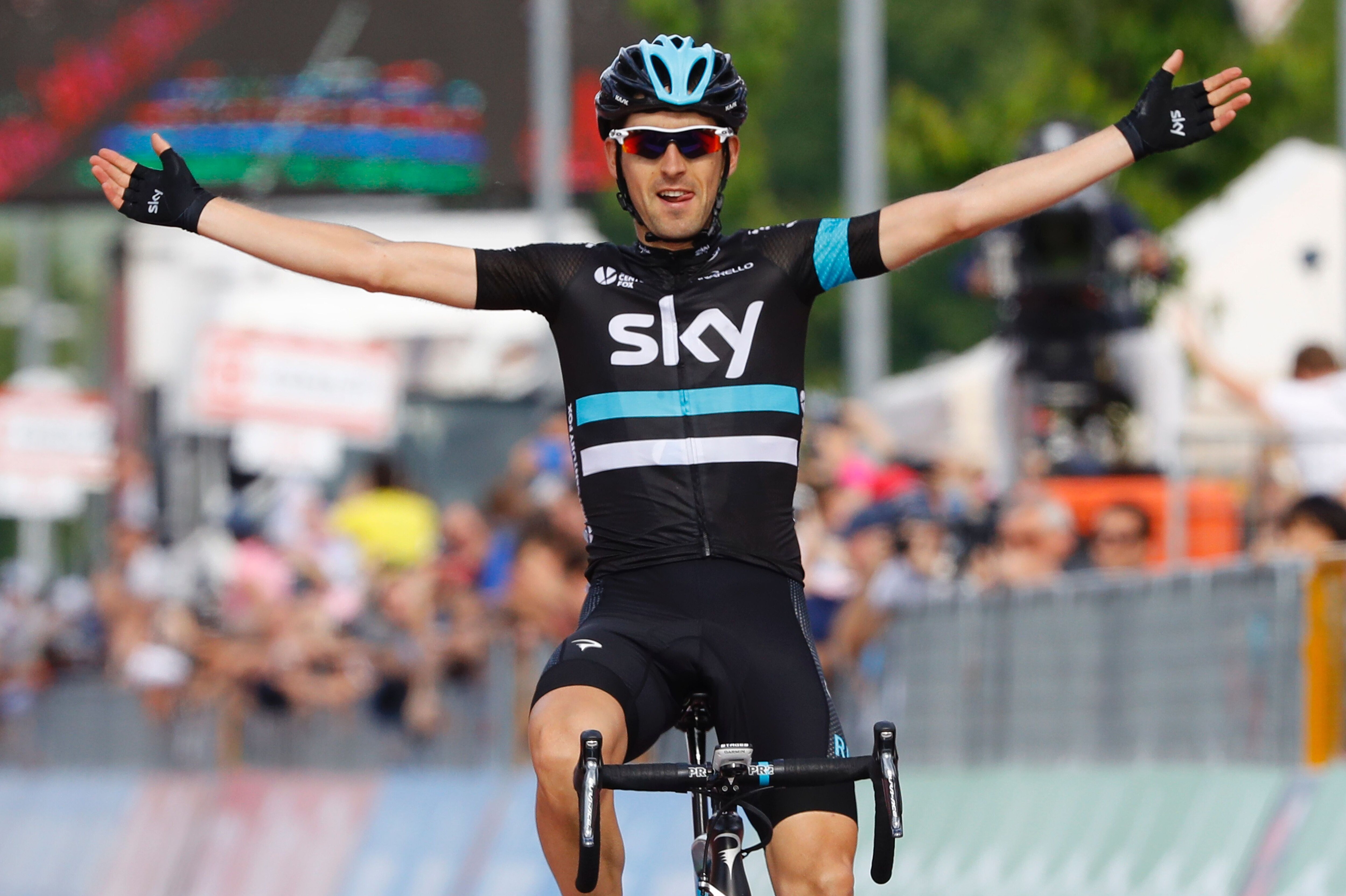 Spain's Mikel Nieve of team Sky celebrates as he crosses the finish to win the 13th stage of the 99th Giro d'Italia, Tour of Italy, from Palmanova and Cividale del Friuli on May 20, 2016. The overall pink leader's jersey switched hands again after a tough mountain run as Movistar's Costa Rican rider Andrey Amador finished alongside race favourites and climb kings Vicenzo Nibali and Alessandro Valverde. AFP PHOTO / LUK BENIES / AFP / LUK BENIES (Photo credit should read LUK BENIES/AFP/Getty Images)