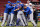 CINCINNATI, OH - APRIL 21:  The Chicago Cubs and a fan celebrate with Jake Arrieta #49 of the Chicago Cubs after Arrieta pitched a no-hitter against the Cincinnati Reds at Great American Ball Park on April 21, 2016 in Cincinnati, Ohio.  (Photo by Jamie Sabau/Getty Images)