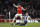 Arsenal's Hector Bellerin, left, competes for the ball with West Bromwich Albion's Jason McClean during the English Premier League soccer match between Arsenal and West Bromwich Albion at the Emirates Stadium in London, Thursday, April 21, 2016.  (AP Photo/Matt Dunham)