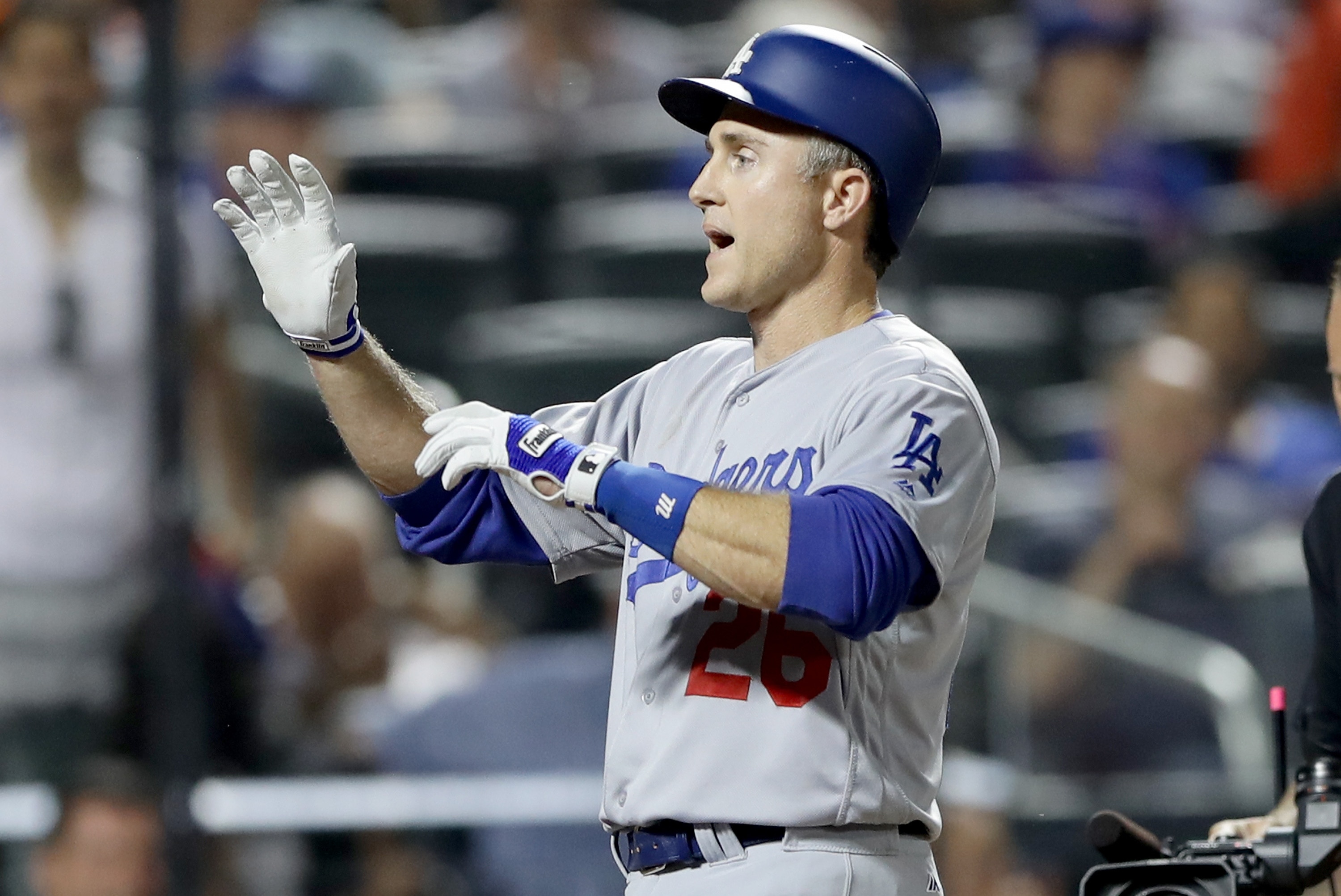 NEW YORK, NY - MAY 28: Chase Utley #26 of the Los Angeles Dodgers celebrates his grand slam in the seventh inning against the New York Mets at Citi Field on May 28, 2016 in the Flushing neighborhood of the Queens borough of New York City. (Photo by Elsa/Getty Images)