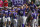 TCU infielder Luken Baker (19) celebrates his solo home run with his teammates in the tenth inning against West Virginia in the championship game of the NCAA college Big 12 conference baseball tournament in Oklahoma City, Sunday, May 29, 2016. TCU won 11-10 in ten innings. (AP Photo/Sue Ogrocki)