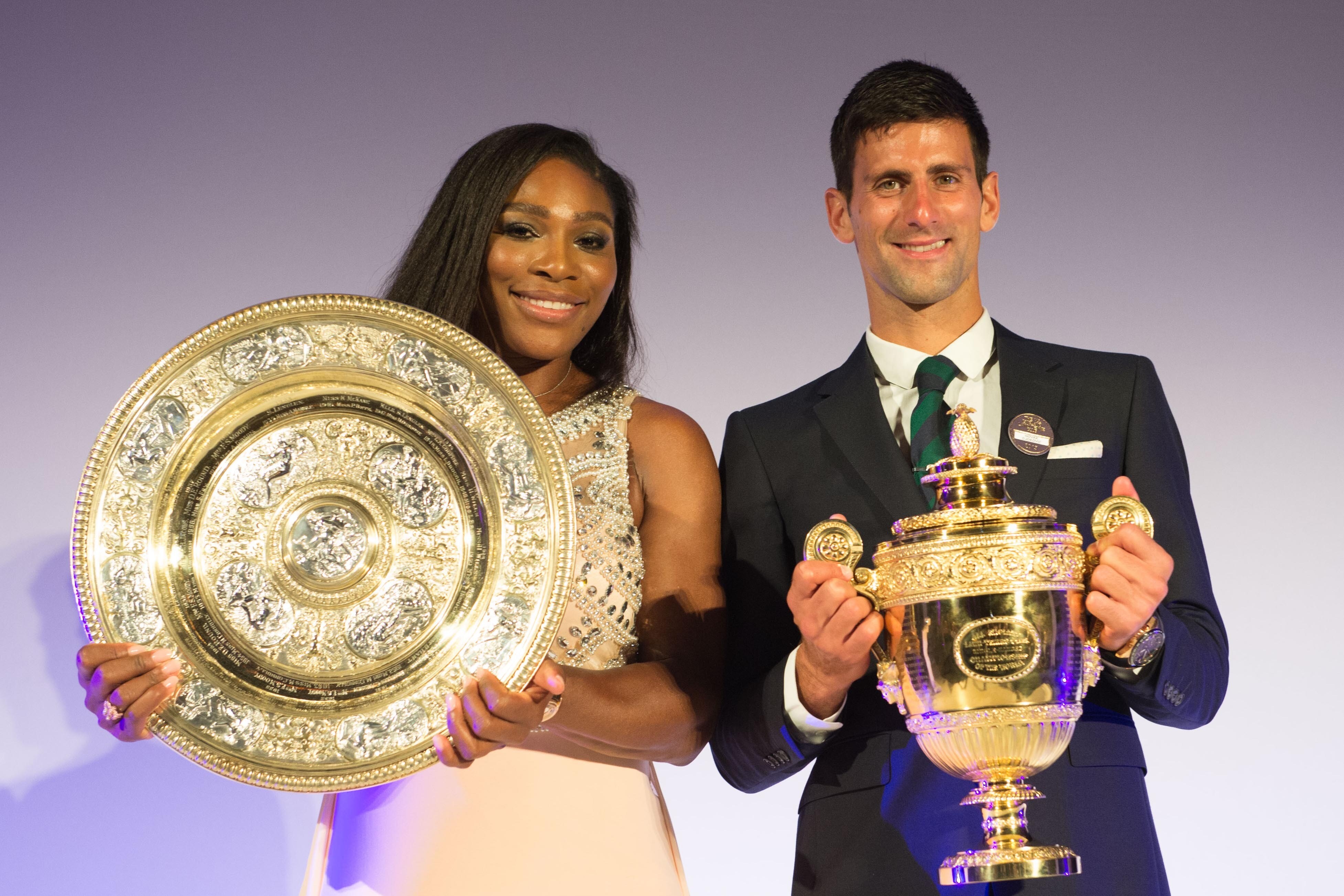 LONDON, ENGLAND - JULY 12: (EDITORIAL USE ONLY - NO COMMERCIAL USEAGE) Serena Williams of the United States and Novak Djokovic of Serbia pose on stage at the Champions Dinner at the Guild Hall on day thirteen of the Wimbledon Lawn Tennis Championships at the All England Lawn Tennis and Croquet Club on July 12, 2015 in London, England. (Photo by Thomas Lovelock - AELTC Pool/Getty Images)