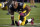 FILE - In this Oct. 1, 2015, file photo, Pittsburgh Steelers outside linebacker James Harrison stretches before the team's NFL football game against the Baltimore Ravens in Pittsburgh.  Harrison’s only motivation for returning to the Steelers is a third Super Bowl ring. The former NFL Defensive Player of the Year briefly mulled retirement before announcing last month he would be back for a 14th season. (AP Photo/Gene J. Puskar, File)