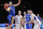 Czech Republic's Tomas Satoransky, left, dunks a basket, while his teammate Jan Vesely, 2nd right, and Serbia's Nemanja Nedovic, 2nd left, and Nemanja Bjelica, right, look on, during the EuroBasket European Basketball Championship quarterfinal match, between Serbia and Czech Republic, at Pierre Mauroy stadium in Lille, northern France, Wednesday, Sept. 16, 2015. (AP Photo/Michel Euler)