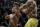 Daniel Cormier, left, fights Anderson Silva during their light heavyweight mixed martial arts bout at UFC 200, Saturday, July 9, 2016, in Las Vegas. (AP Photo/John Locher)
