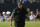 Phil Mickelson of the United States celebrates and the crowd applaud after he made a birdie put on the 14th green during the first round of the British Open Golf Championship at the Royal Troon Golf Club in Troon, Scotland, Thursday, July 14, 2016. (AP Photo/Matt Dunham)