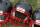 FILE - In this Aug. 4, 2012, file photo, Riddell football helmets that were given to a group of youth football players from the Akron Parents Pee Wee Football League are shown in Akron, Ohio. Seven football organizations are about to receive equipment from helmet manufacturer Riddell through the company's Smarter Football Commitment. The groups, located in Massachusetts, Pennsylvania, Florida, Michigan and California, will have equipment donated to them by Riddell in the $100,000 program. (AP Photo/Gene J. Puskar, File)