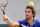 Uruguay's Pablo Cuevas returns in the third round match of the French Open tennis tournament against Tomas Berdych of the Czech Republic at the Roland Garros stadium in Paris, France, Saturday, May 28, 2016. (AP Photo/Michel Euler)
