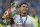 Portugal's Cristiano Ronaldo poses with the trophy at the end of the Euro 2016 final soccer match between Portugal and France at the Stade de France in Saint-Denis, north of Paris, Sunday, July 10, 2016. Portugal won 1-0. (AP Photo/Frank Augstein)
