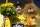 Britain's Chris Froome, wearing the overall leader's yellow jersey, celebrates on the podium after the eighteenth stage of the Tour de France cycling race, an individual time trial over 17 kilometers (10.6 miles) with start in Sallanches and finish in Megeve, France, Thursday, July 21, 2016. (AP Photo/Peter Dejong)