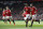Manchester United's Marcus Rashford, second right, celebrates with teammate Juan Mata after he sores the opening goal of the game during the English Premier League soccer match between Manchester United and Arsenal at Old Trafford Stadium, Manchester, England, Sunday, Feb. 28, 2016. (AP Photo/Jon Super)