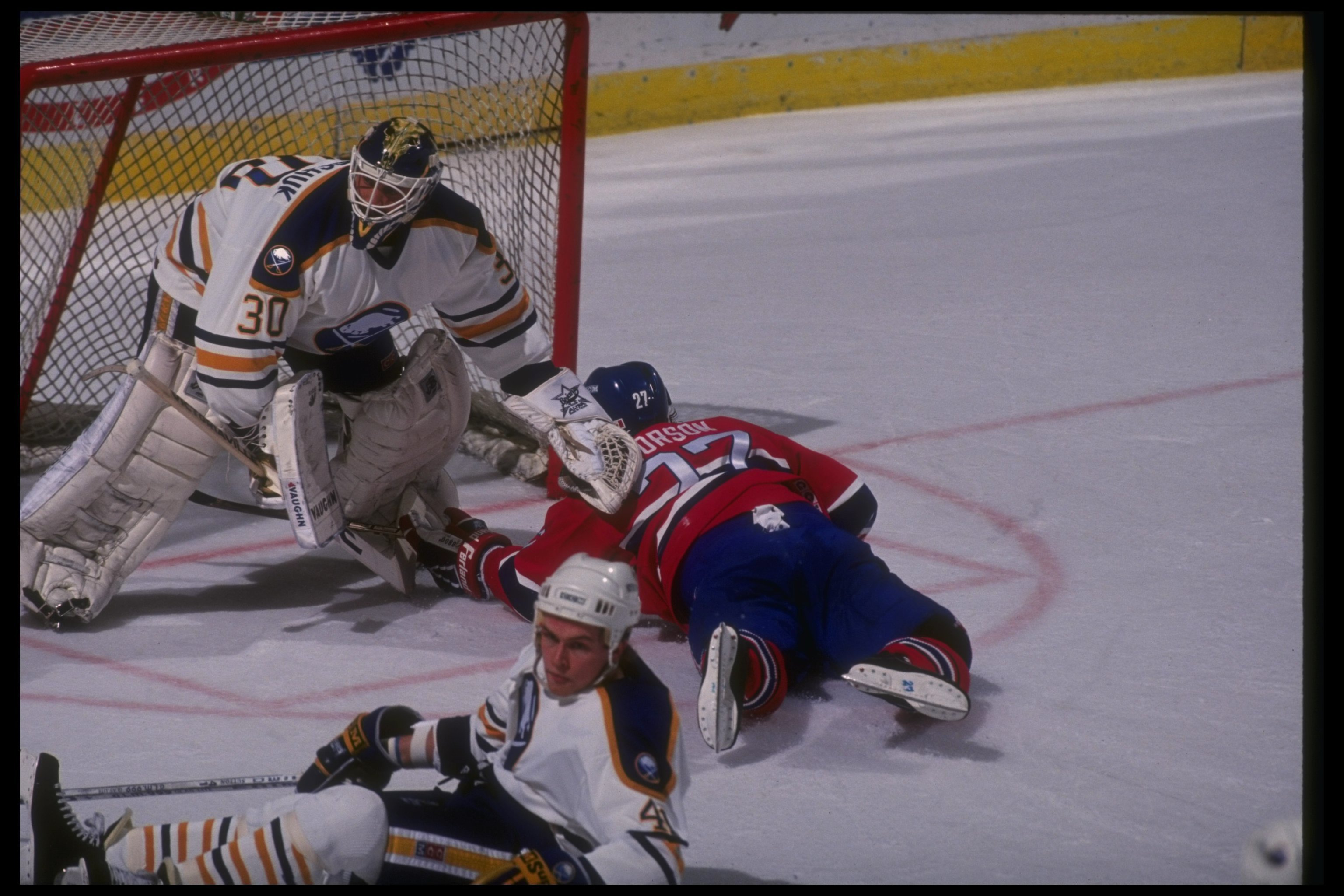 1990-1991: Goaltender Clint Malarchuk of the Buffalo Sabres tends goal during a game against the Montreal Canadiens at Memorial Auditorium in Buffalo, New York. Mandatory Credit: Rick Stewart /Allsport