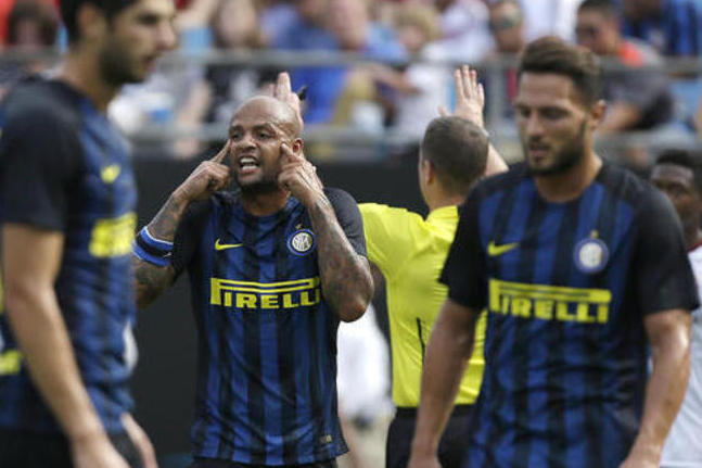 Inter Milan midfielder Felipe Melo tries to get his teammates to start thinking as they fall behind Bayern Munich, 4-0, during the first half of an International Champions Cup soccer match Saturday, July 30, 2016 in Charlotte, N.C. (AP Photo/Bob Leverone)
