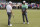 Rory McIlroy, of Northern Ireland, talks with Tiger Woods on the practice green before the Masters golf tournament Wednesday, April 8, 2015, in Augusta, Ga. (AP Photo/Darron Cummings)